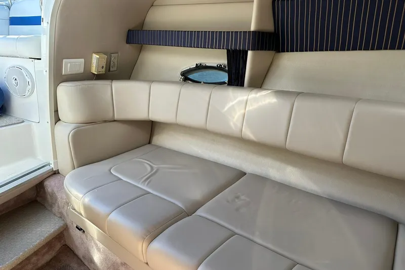 Slide: The Image of Interior of 2003 Formula 260 Sun Sport boat with beige leather seating. - 16