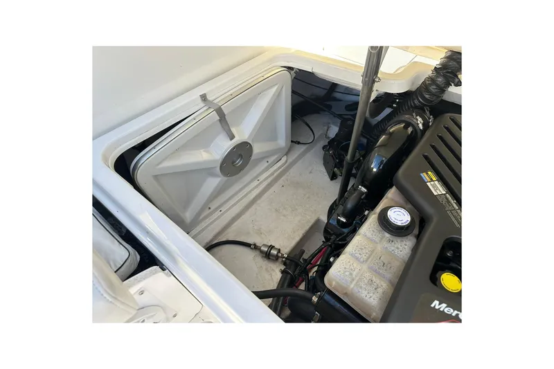 Slide: The Image of Engine compartment of a 2003 Formula 260 Sun Sport boat, showing mechanical components. - 18