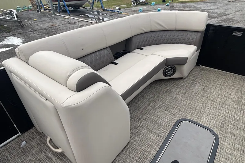 Slide: The Image of Luxurious seating on 2021 Harris Sunliner 230 pontoon boat, featuring elegant upholstery and spacious design. - 12
