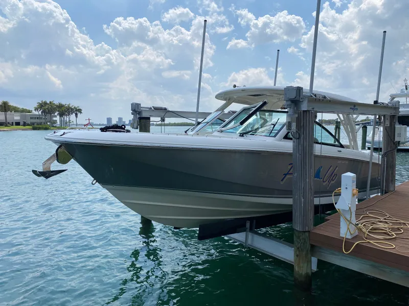 Slide: The Image of 2017 Boston Whaler 320 Vantage docked on a sunny day. - 1