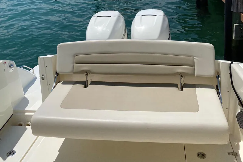 Slide: The Image of 2017 Boston Whaler 320 Vantage boat with dual engines and rear seating. - 10