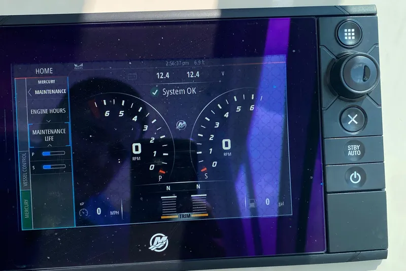 Slide: The Image of Dashboard display of a 2017 Boston Whaler 320 Vantage boat showing system status. - 29