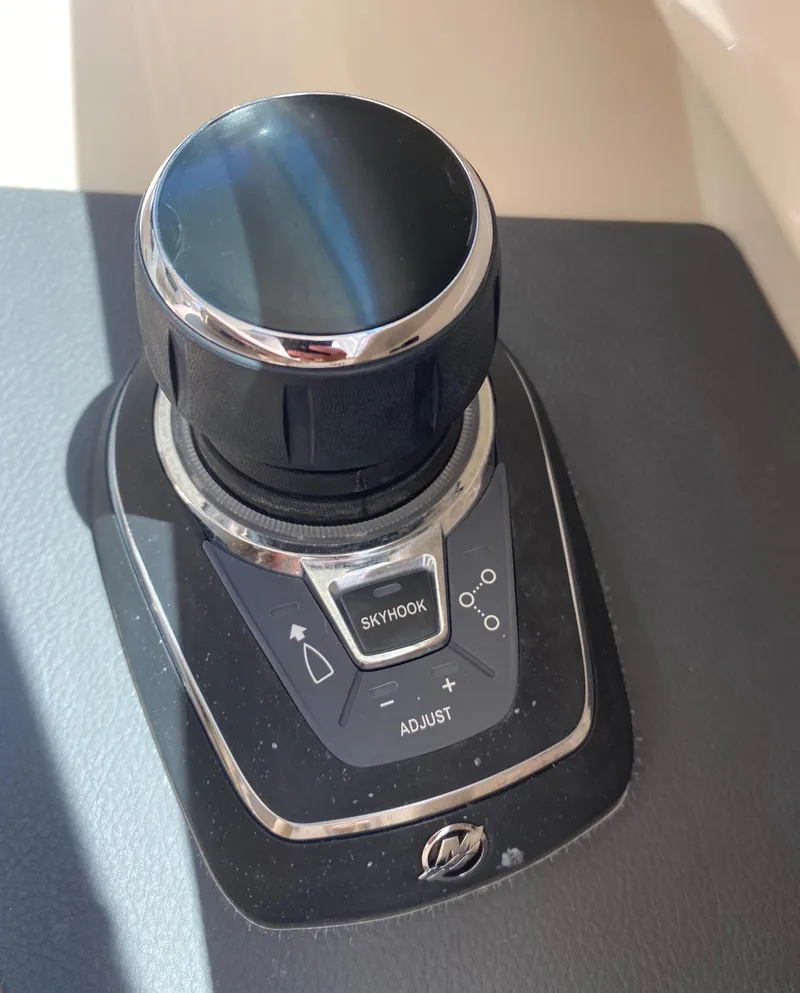 Slide: The Image of Joystick control on 2017 Boston Whaler 320 Vantage boat dashboard. - 30