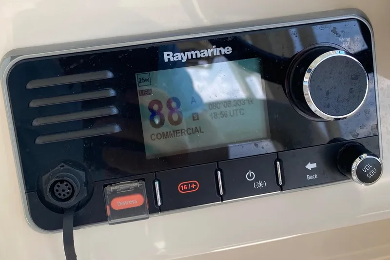 Slide: The Image of Raymarine marine radio display on 2017 Boston Whaler 320 Vantage boat. - 32