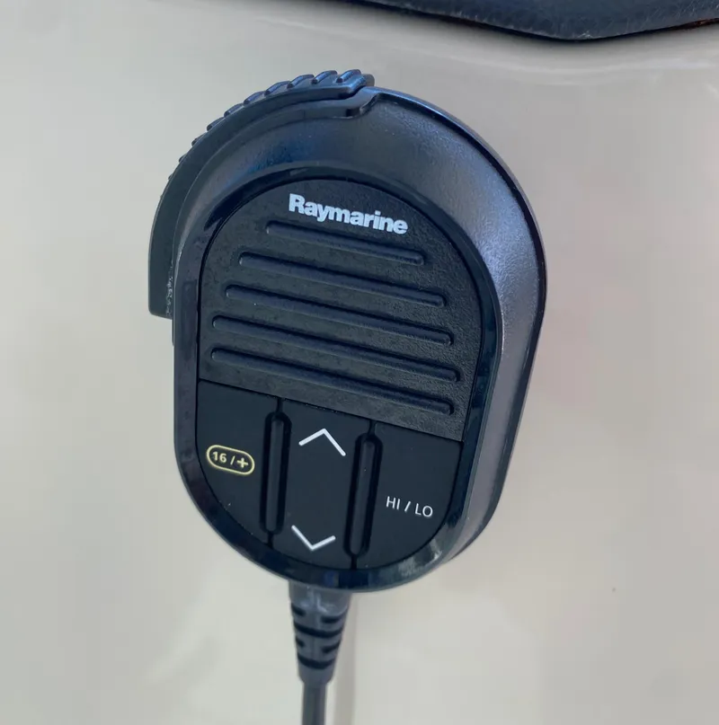 Slide: The Image of Raymarine marine radio microphone on a 2017 Boston Whaler 320 Vantage boat. - 34