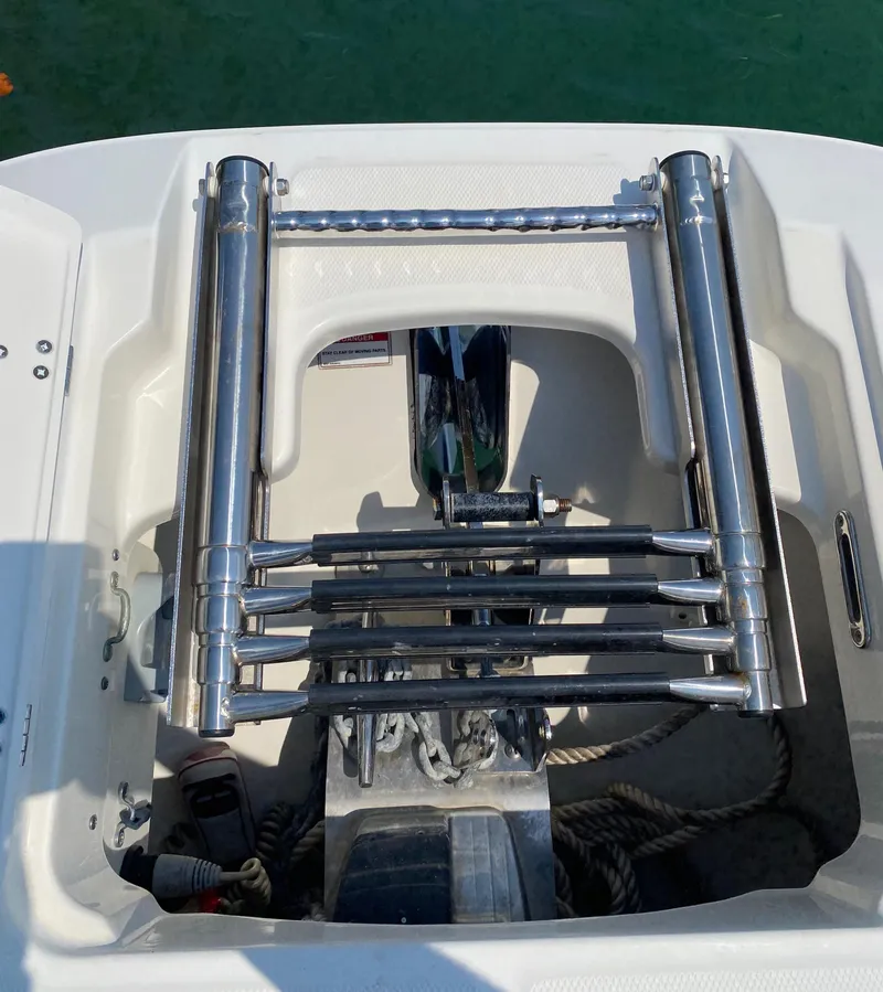 Slide: The Image of 2017 Boston Whaler 320 Vantage boat ladder and anchor storage area. - 42