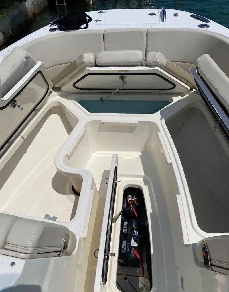 Slide: The Image of 2017 Boston Whaler 320 Vantage boat interior with open storage compartments. - 43