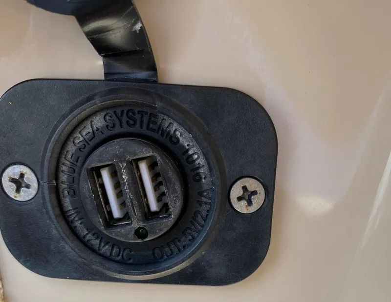 Slide: The Image of USB charging port on a 2017 Boston Whaler 320 Vantage boat. - 46