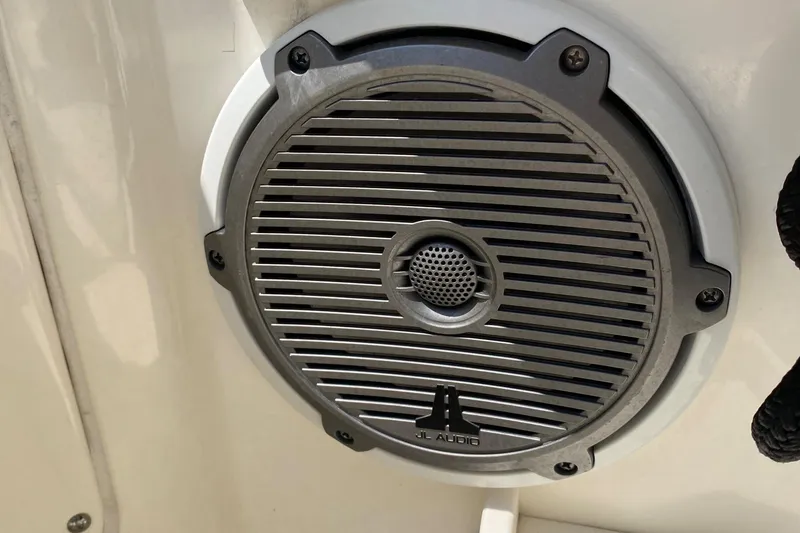 Slide: The Image of Speaker on 2017 Boston Whaler 320 Vantage boat, featuring JL Audio branding. - 49