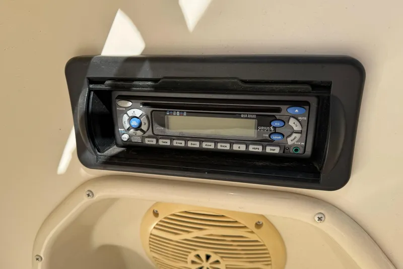 Slide: The Image of 2007 Hurricane SunDeck 217 OB stereo system with SiriusXM and speaker. - 16