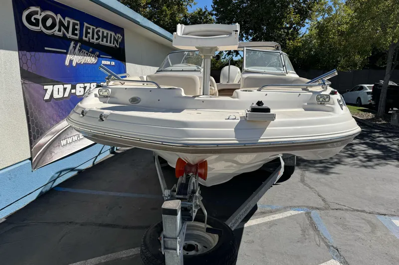 Slide: The Image of 2007 Hurricane SunDeck 217 OB boat on trailer at Gone Fishin' Marine dealership. - 2
