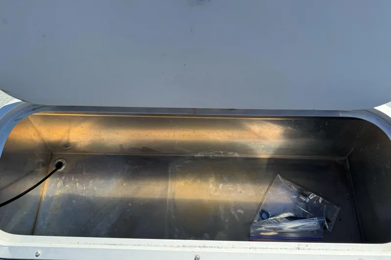 Slide: The Image of Open storage compartment in 2023 North River 21 X 84 Seahawk boat. - 11