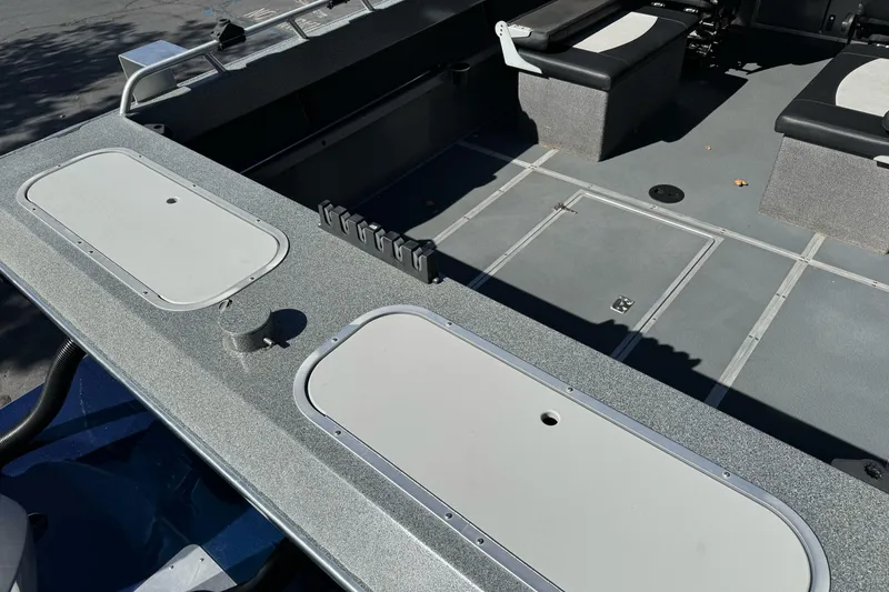 Slide: The Image of 2023 North River 21 X 84 Seahawk boat interior with seating and storage compartments. - 12