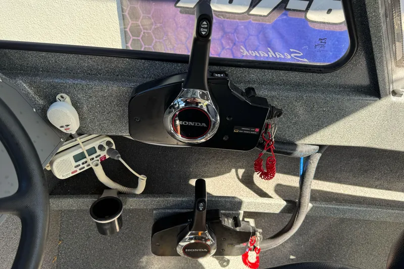 Slide: The Image of Control panel of 2023 North River 21 X 84 Seahawk boat with Honda throttle. - 19