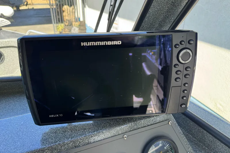Slide: The Image of Humminbird Helix 10 fish finder on 2023 North River 21 X 84 Seahawk boat. - 21