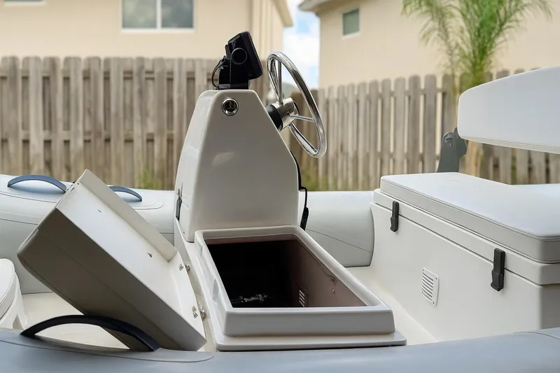 Slide: The Image of 2018 AB Inflatables Mares 10 VSX boat interior with open storage compartment. - 4