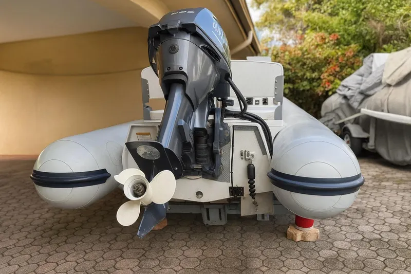 Slide: The Image of 2018 AB Inflatables Mares 10 VSX with outboard motor, parked on a paved surface. - 8