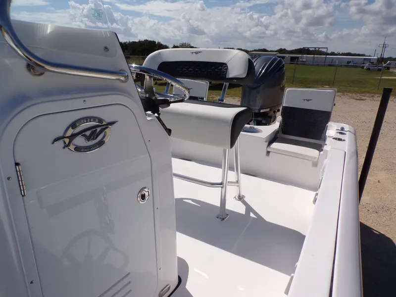 Slide: The Image of 2026 Tidewater 2110BMT boat with modern features and engine. - 39
