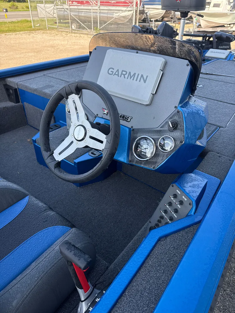 Slide: The Image of Interior of 2025 Vexus AVX1880 boat with Garmin control panel. - 38