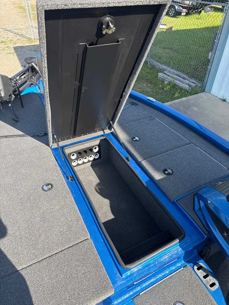 Slide: The Image of Open storage compartment in Vexus AVX1880 boat, model 2025. - 48