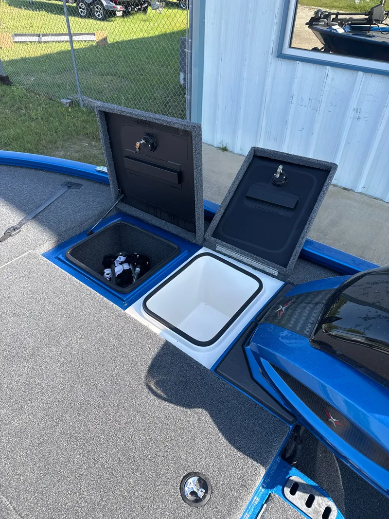 Slide: The Image of Vexus AVX1880 2025 boat with open storage compartments. - 49