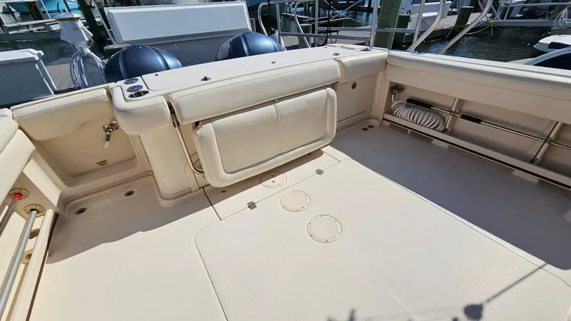 Slide: The Image of 2016 Grady-White Express 330 boat deck with seating and storage. - 14