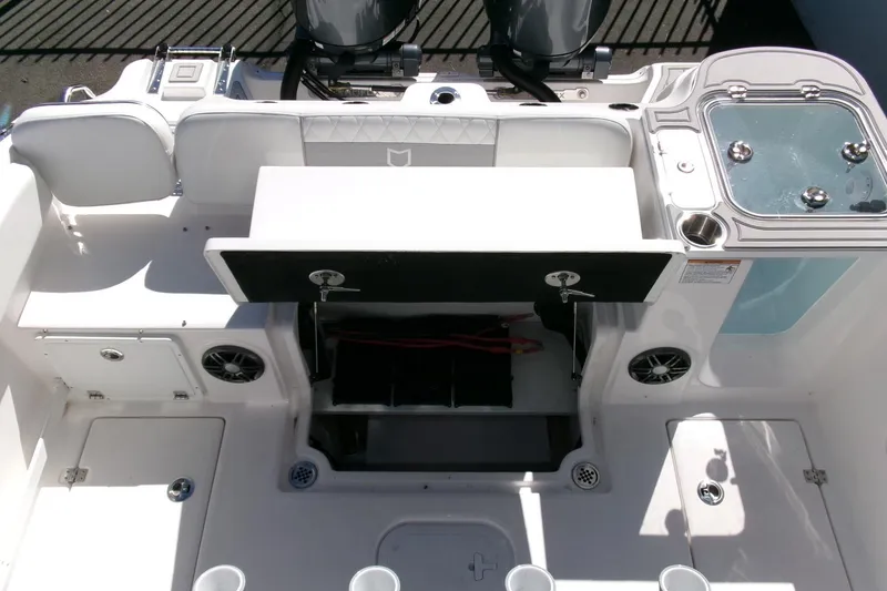 Slide: The Image of 2026 Sea Fox 268 Commander boat interior with storage compartments and seating. - 26