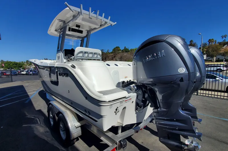 Slide: The Image of 2026 Sea Fox 268 Commander boat with Yamaha engines on a trailer. - 3