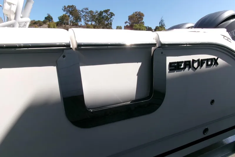 Slide: The Image of 2026 Sea Fox 268 Commander boat side view with logo and sleek design. - 31