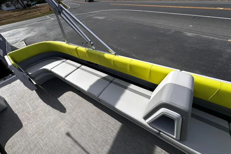 Slide: The Image of 2025 Avalon 2185 Aura Quad Lounge interior with modern seating and vibrant accents. - 15