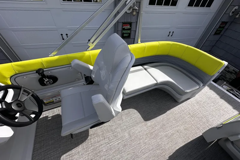Slide: The Image of 2025 Avalon 2185 Aura Quad Lounge interior with modern seating and steering wheel. - 16