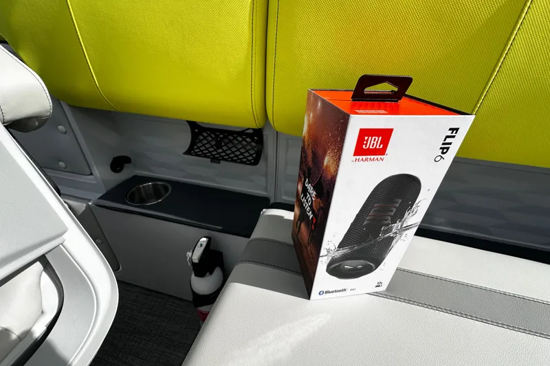 Slide: The Image of Boxed JBL Flip 6 speaker on Avalon 2185 Aura Quad Lounge, Twin Toon 2025 boat seat. - 24