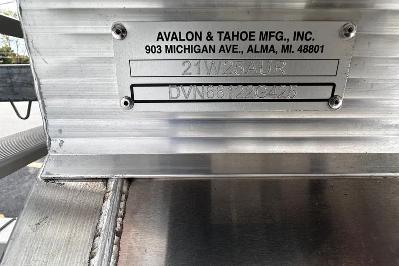 Slide: The Image of Metal identification plate on Avalon 2185 Aura Quad Lounge, Twin Toon, 2025 model. - 25