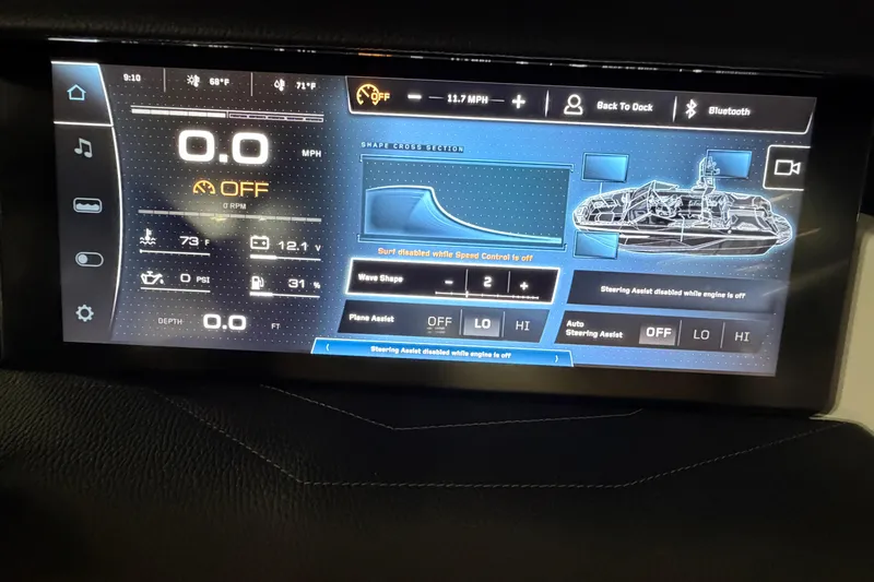Slide: The Image of 2025 Nautique Super Air Nautique G23 dashboard display showing speed, controls, and settings. - 11