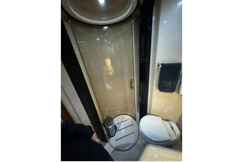 Slide: The Image of Bathroom interior of 2003 Cruisers Yachts 4370 Express with shower and toilet. - 21