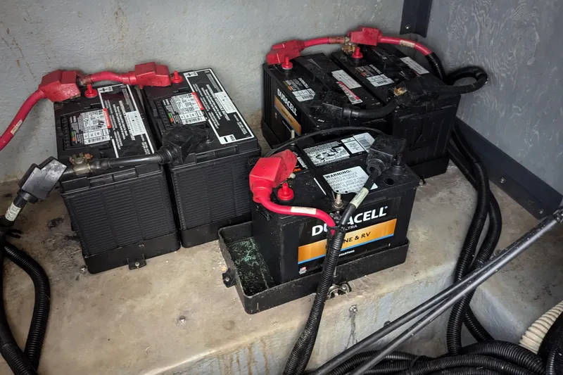 Slide: The Image of Batteries in a 2000 Sea Ray 380 Sundancer boat engine compartment. - 20