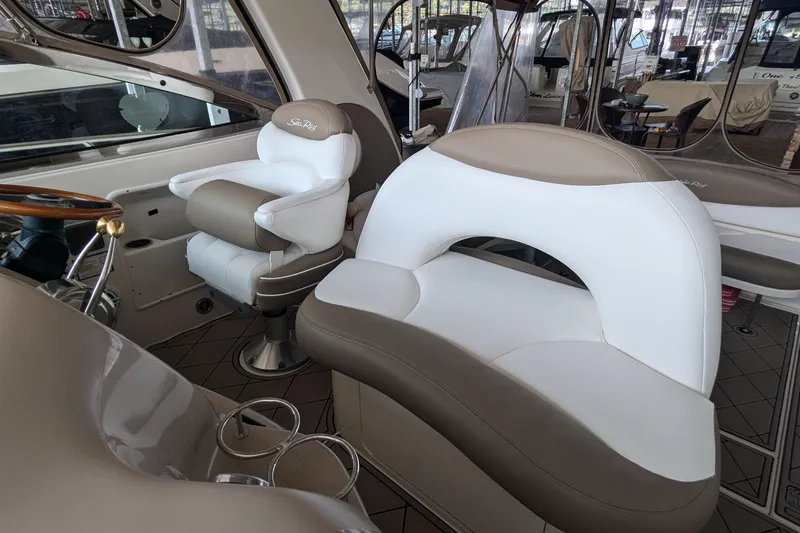 Slide: The Image of Interior of 2000 Sea Ray 380 Sundancer with beige and white seating. - 22