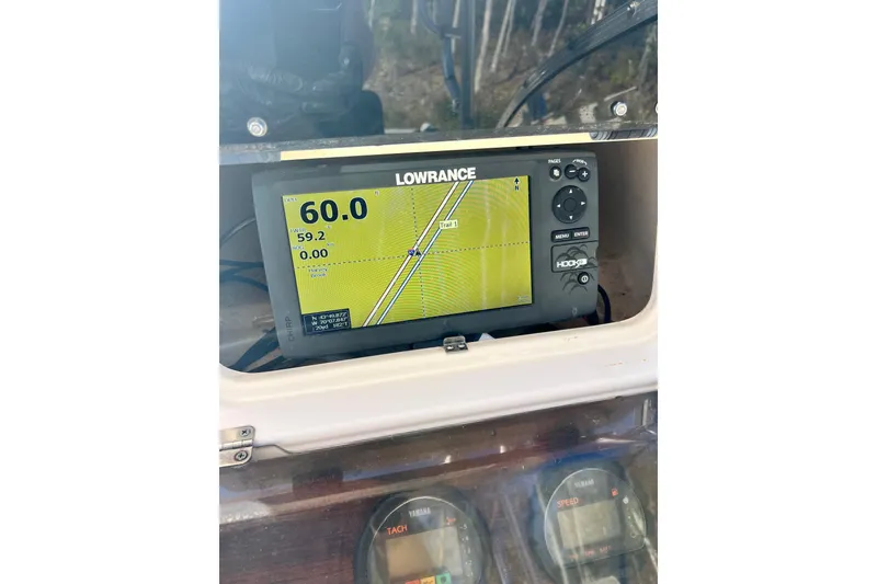 Slide: The Image of Lowrance GPS system on 1999 Grady-White Islander 268 boat dashboard. - 24