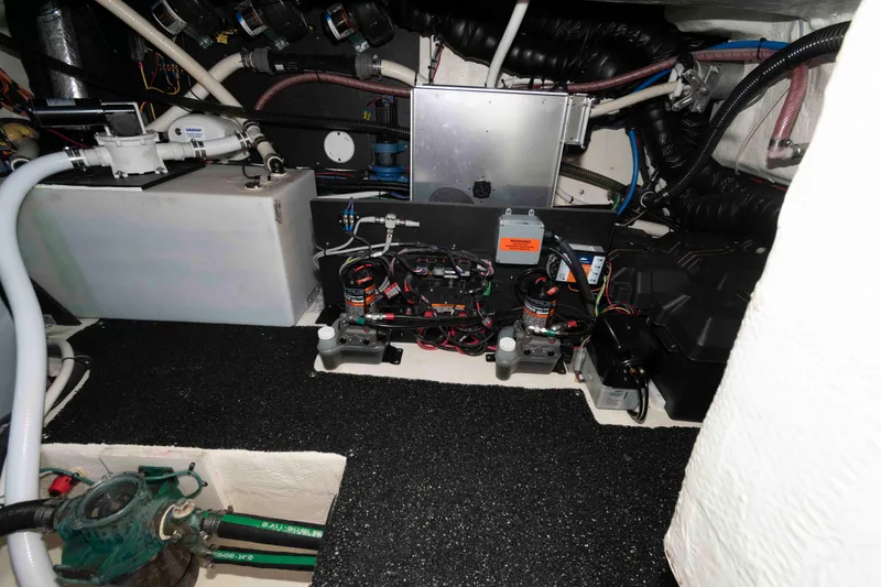 Slide: The Image of Engine room of 2020 Regal 38 XO yacht with wiring and equipment. - 28