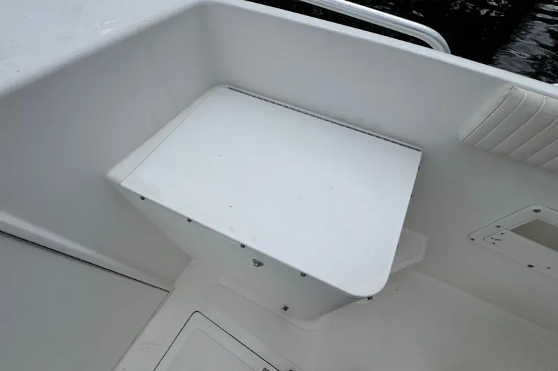 Slide: The Image of 1993 Marlin 35 CC Sportfish cuddy cabin with life jackets and storage. - 29