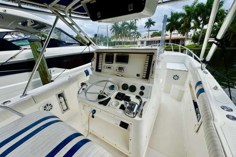 Slide: The Image of Close-up of a boat navigation system on a 1993 Marlin 35 CC Sportfish. - 45