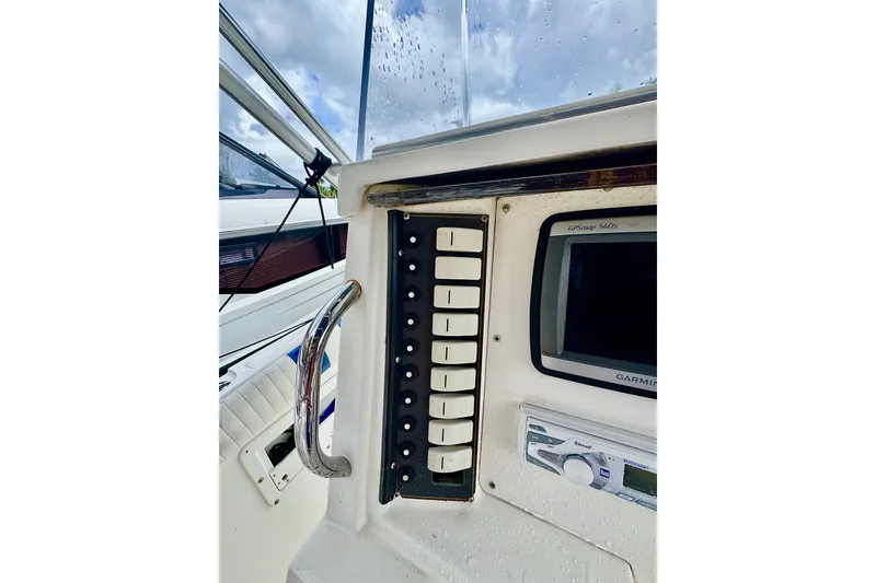 Slide: The Image of Control panel on 1993 Marlin 35 CC Sportfish boat with cuddy cabin. - 47