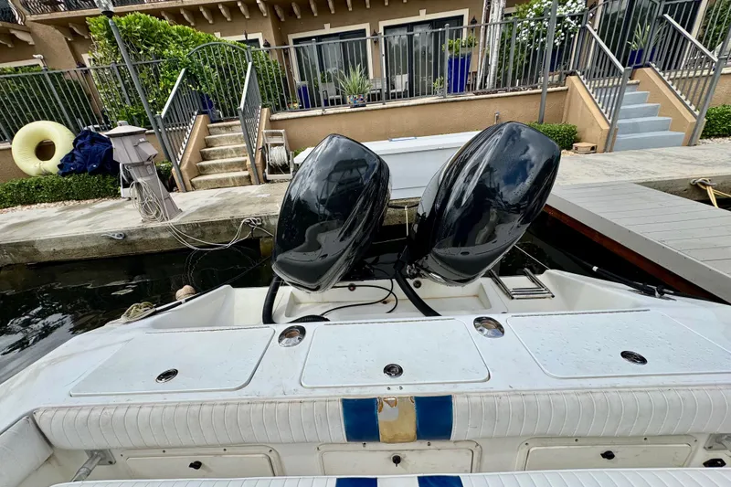 Slide: The Image of 1993 Marlin 35 CC Sportfish boat interior with steering console and seating. - 61