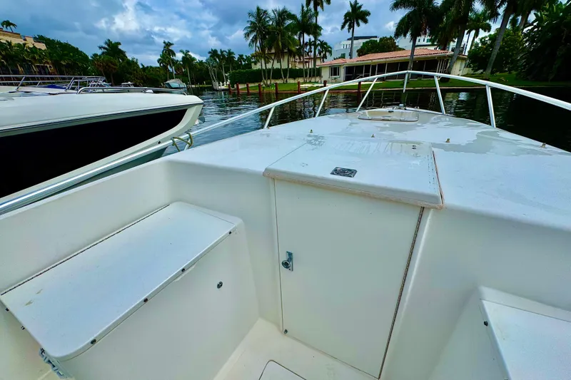 Slide: The Image of 1993 Marlin 35 CC Sportfish boat interior with blue and white seating. - 66