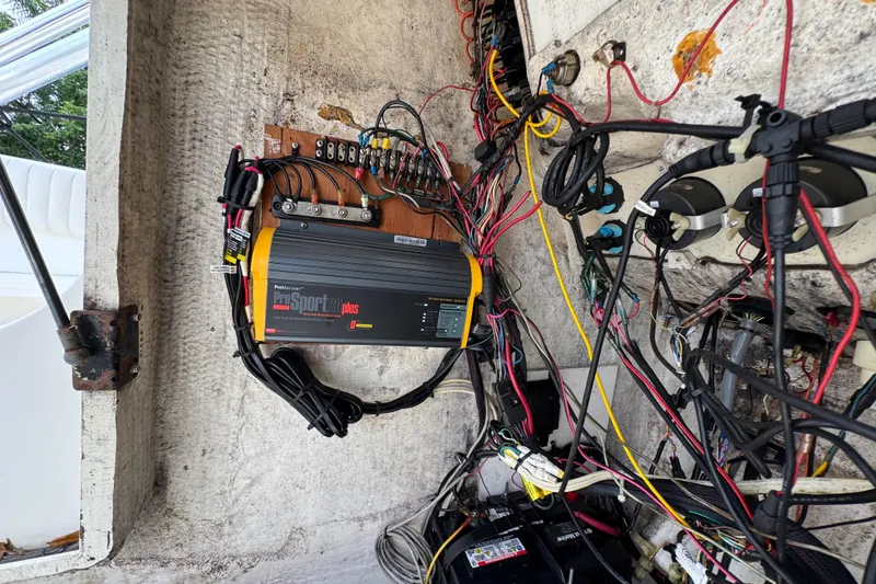 Slide: The Image of Electrical wiring and components inside a 1993 Marlin 35 CC Sportfish boat. - 72