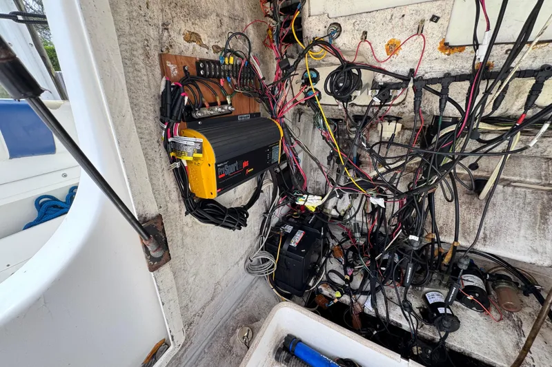 Slide: The Image of 1993 Marlin 35 CC Sportfish boat wiring and electrical components in cuddy cabin. - 73