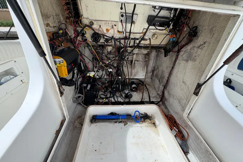 Slide: The Image of 1993 Marlin 35 CC Sportfish boat with cuddy cabin, featuring a sturdy metal frame. - 74