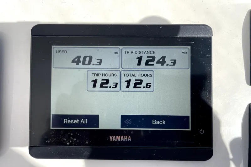 Slide: The Image of Yamaha display showing fuel usage, trip distance, and hours for 2024 NorthCoast 235 boat. - 10
