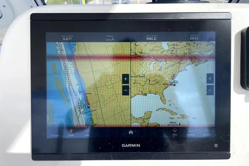 Slide: The Image of Garmin navigation display on 2024 NorthCoast 235 boat, showing U.S. coastal map. - 26