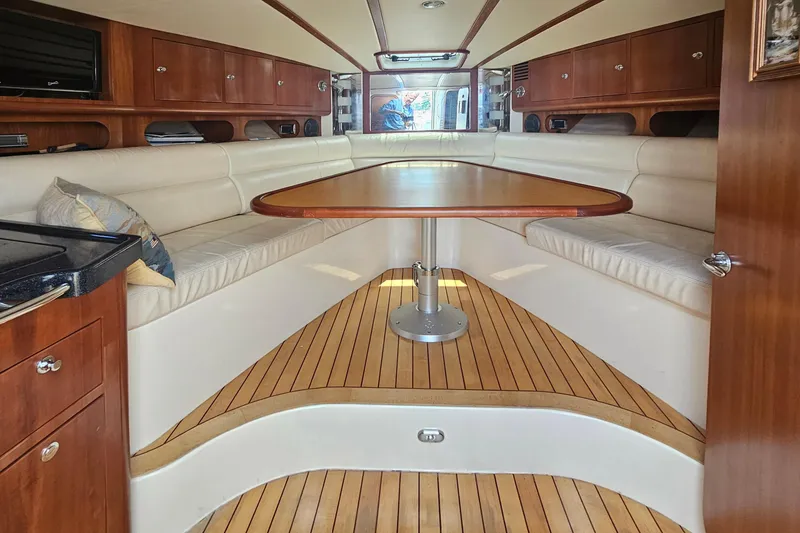Slide: The Image of Luxurious interior of 2006 Chris-Craft Corsair 36 with elegant wood and leather seating. - 21